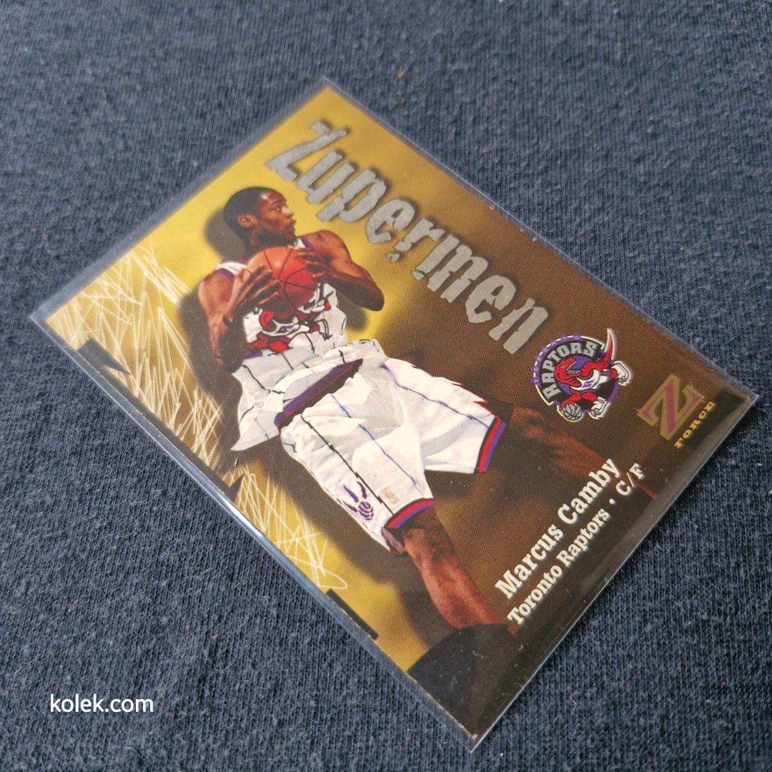 1997-98 Skybox Z-Force Zupermen Marcus Camby (Category: Raw Singles) located in San Pedro. Submitted by .kolek.com (Listing ID 1457762771, Image 2). Description: NBA Card (Raw) Excellent Condition Clean card Sharp edges Smooth Surface No Toploader❌️ What U see is What U Get Sa nakaka appreciate lang MoP: Gcash J&T Courier Pickup or Book any Rider Buyer's book and expense Loc: San Pedro, Laguna 📣BBox 0.2kg.