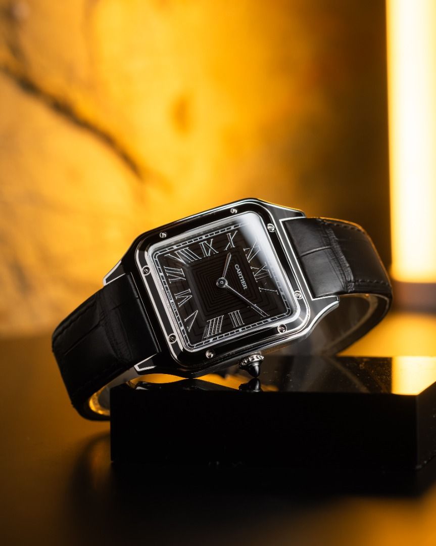 2025 DUMONT BLACK (Category: Luxury Watches) located in Caloocan City. Submitted by kaiwatchcavemnl (Listing ID 1457781456, Image 1). Description: - Cartier Santos de Cartier Watch - Black Dial with Roman Numerals - Black Alligator Leather Strap - Sophisticated and Classic Design - Timeless Piece for Watch Enthusiasts - Versatile for Formal or Casual Wear.