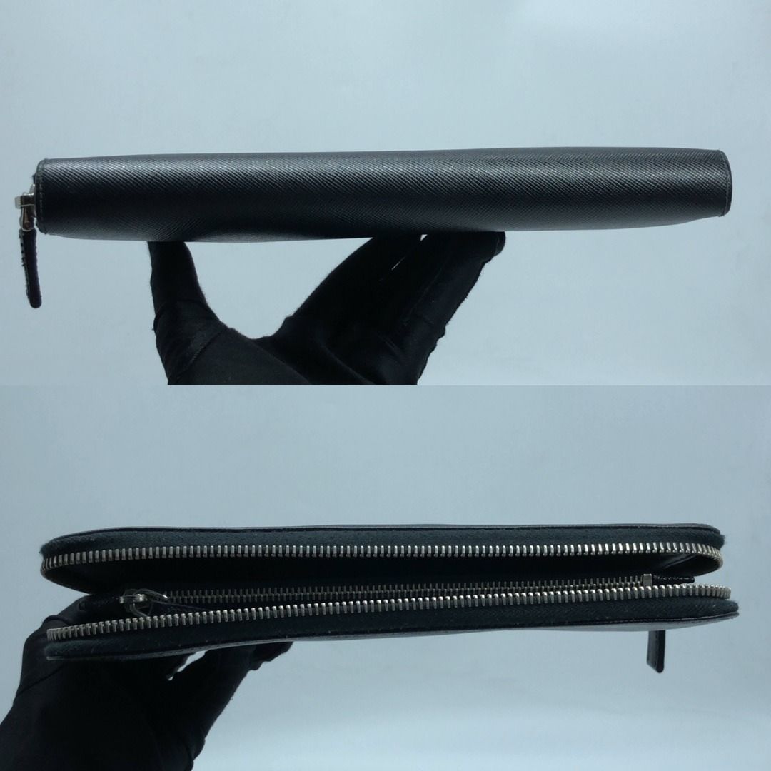 267008181 PRADA SLG SAFFIANO 1ML188 (Category: Luxury Bags & Wallets) located in Taguig. Submitted by ecoring.ph (Listing ID 1457784241, Image 3). Description: ◆CONDITION: B ◆DESCRIPTIONS: (Other defects/info:) OUTER: The body and bottom of the bag have minimal scratches and show visible signs of use. Overall, the bag remains in good and almost-new condition. INNER: The zipper closure of the organizer has fabric pilling and stains, showing visibl