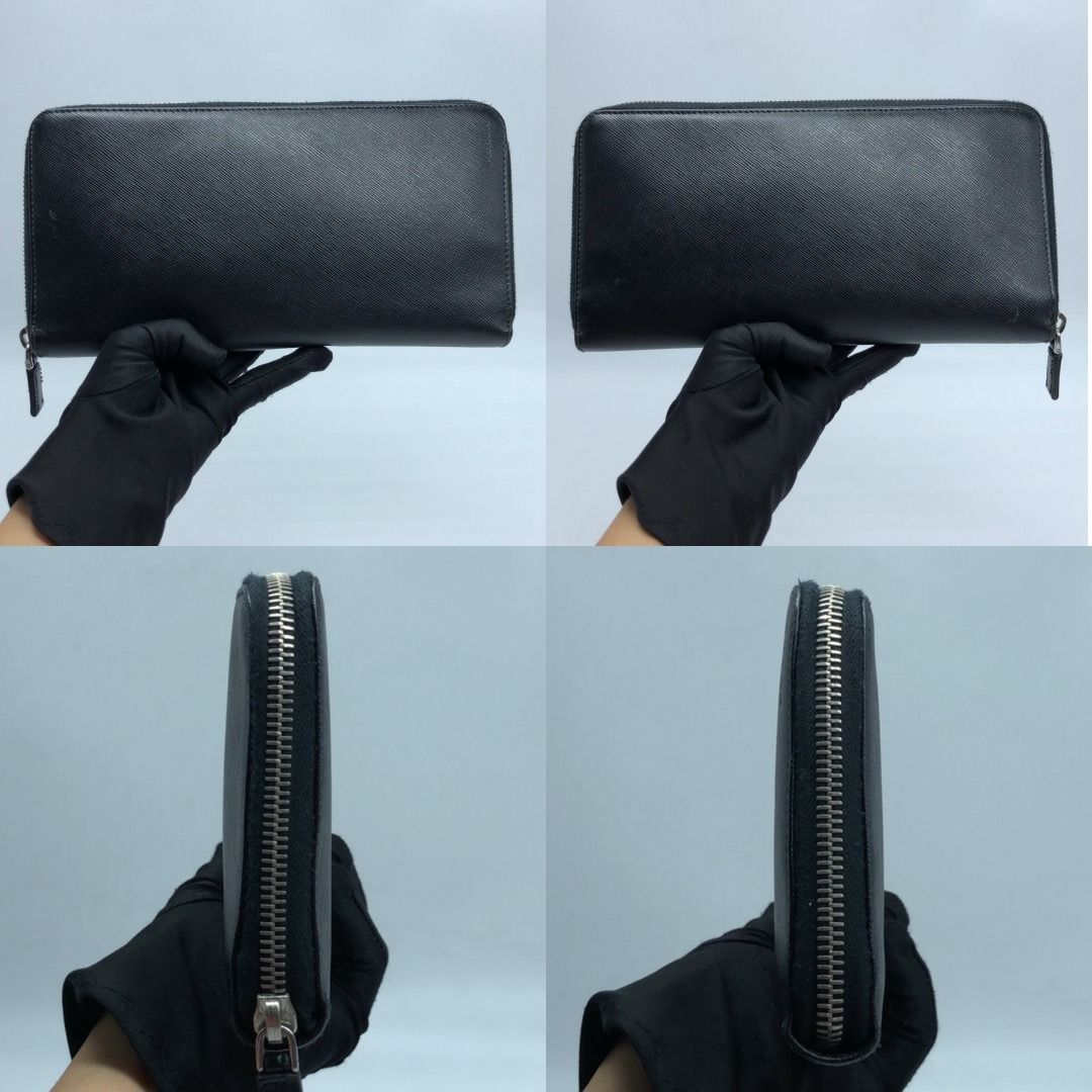 267008181 PRADA SLG SAFFIANO 1ML188 (Category: Luxury Bags & Wallets) located in Taguig. Submitted by ecoring.ph (Listing ID 1457784241, Image 2). Description: ◆CONDITION: B ◆DESCRIPTIONS: (Other defects/info:) OUTER: The body and bottom of the bag have minimal scratches and show visible signs of use. Overall, the bag remains in good and almost-new condition. INNER: The zipper closure of the organizer has fabric pilling and stains, showing visibl