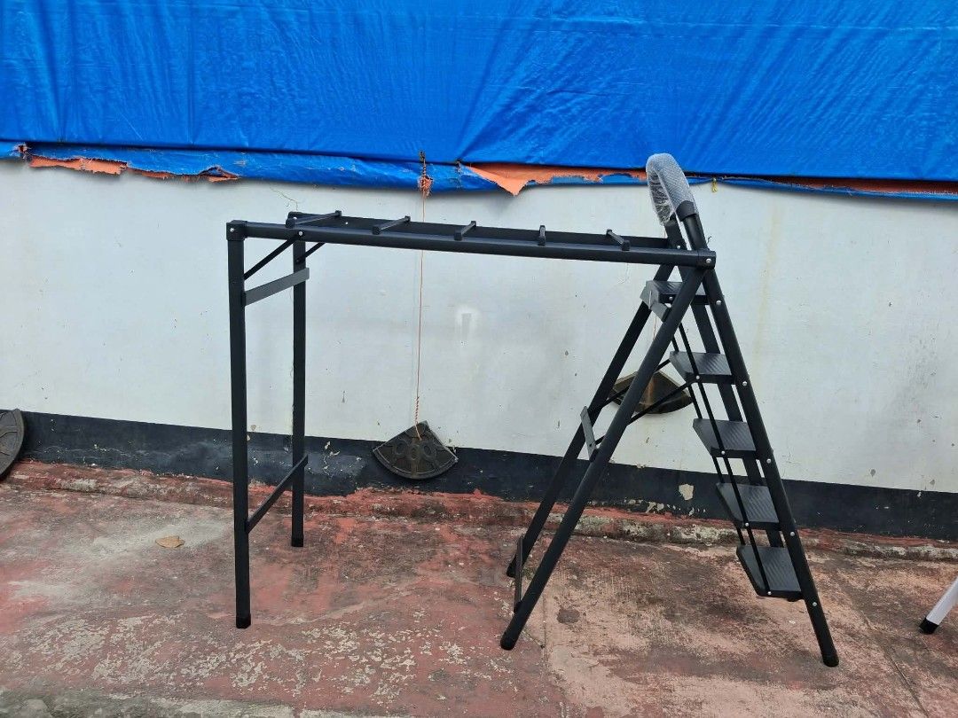 2in1 Folding Ladder clothing rack (Category: Clothes Drying Rack) located in Manila. Submitted by dolorchris69891 (Listing ID 1457732713, Image 2). Description: 2-in-1 Folding Ladder Clothes Drying Rack A ladder multi-purpose, is a ladder, but also drying clothes rack ~ 'Use the living room as a flower stand." "Bathroom, shelving "Drying rack on the balcony' * Product Description -Climbing to take things, strong support stable, daily use as a lad