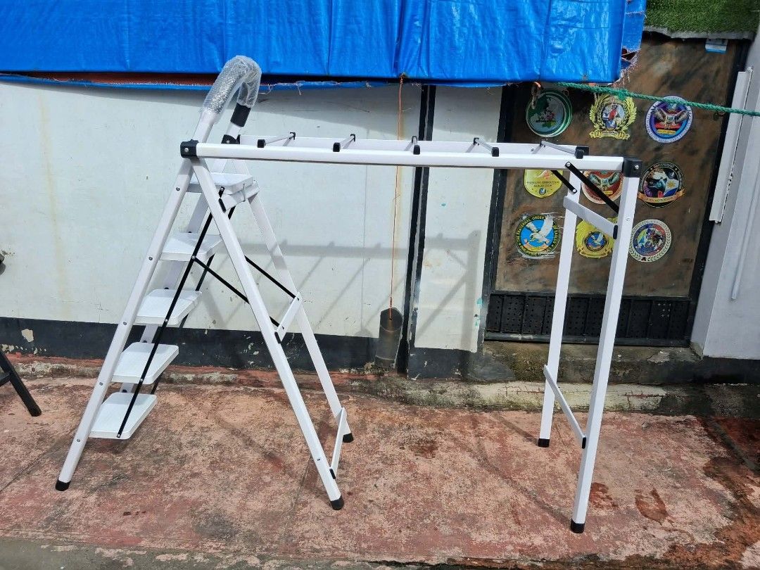 2in1 Folding Ladder clothing rack (Category: Clothes Drying Rack) located in Manila. Submitted by dolorchris69891 (Listing ID 1457732713, Image 1). Description: 2-in-1 Folding Ladder Clothes Drying Rack A ladder multi-purpose, is a ladder, but also drying clothes rack ~ 'Use the living room as a flower stand." "Bathroom, shelving "Drying rack on the balcony' * Product Description -Climbing to take things, strong support stable, daily use as a lad