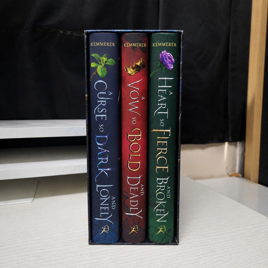 A Curse So Dark and Lonely Trilogy (Category: Storybooks) located in Manila. Submitted by pixelnprintlab (Listing ID 1457884980, Image 3). Description: 📚✨ A CURSE SO DARK AND LONELY TRILOGY ✨📚 A stunning hardbound fantasy trilogy to add to your bookshelf! 🥀👑🌹 Includes: ✔️ BOX 📖 A Curse So Dark and Lonely 📖 A Heart So Fierce and Broken 📖 A Vow So Bold and Deadly ✔️ Hardcopy ✔️ Original ✔️ Complete Trilogy Set ✔️ Ships within 7 days ✨ Perfe