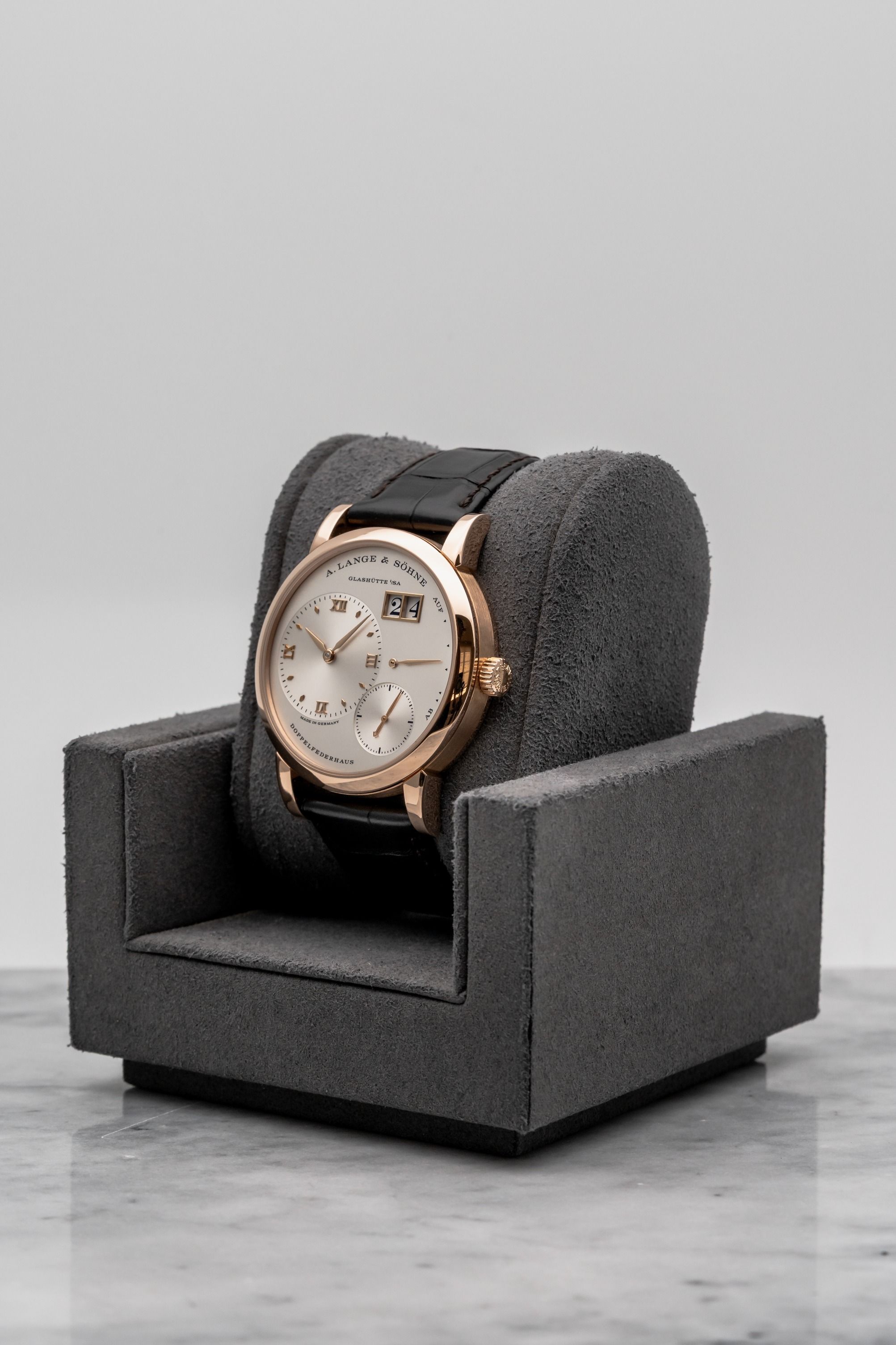 A. Lange & Söhne Lange 1 191.032 Argenté Dial • Watch Only (Category: Watches) located in Singapore. Submitted by timetells (Listing ID 1457737962, Image 2). Description: Brand: A. Lange & Söhne Model: Lange 1 Reference Number: 191.032 Year: NA Case Size: 38 mm Case Material: 18K Pink Gold Dial: Argenté Dial with Off-Centre Time Display, Small Seconds, Outsize Date and Power Reserve Indicator Strap: Dark Brown Leather Strap with 18K Pink Gold Buc