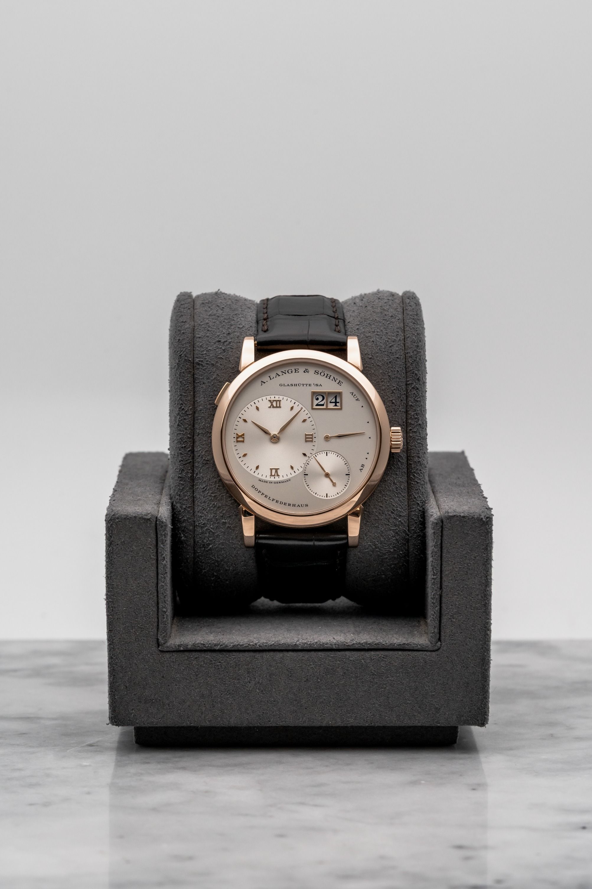 A. Lange & Söhne Lange 1 191.032 Argenté Dial • Watch Only (Category: Watches) located in Singapore. Submitted by timetells (Listing ID 1457737962, Image 1). Description: Brand: A. Lange & Söhne Model: Lange 1 Reference Number: 191.032 Year: NA Case Size: 38 mm Case Material: 18K Pink Gold Dial: Argenté Dial with Off-Centre Time Display, Small Seconds, Outsize Date and Power Reserve Indicator Strap: Dark Brown Leather Strap with 18K Pink Gold Buc