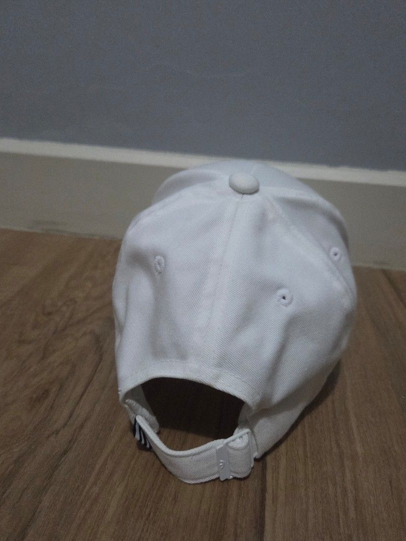 [Adidas] Cap White Trefoil Logo (W-56cm) (Category: Hats & Beanies) located in Makati City. Submitted by skyioh (Listing ID 1457829963, Image 3). Description: - 💯original - Washed/clean 📌Location : Makati 📌Payment : Gcash 📌Shipping : on Buyer. You may book grab/lalamove etc.
