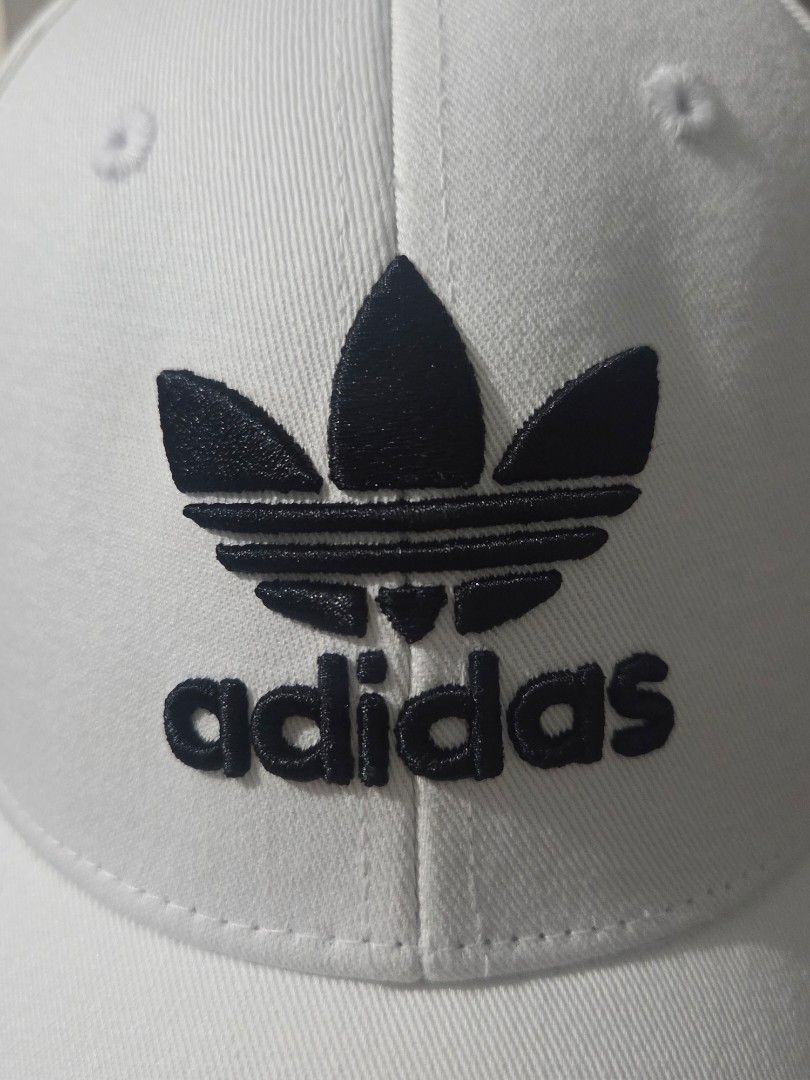 [Adidas] Cap White Trefoil Logo (W-56cm) (Category: Hats & Beanies) located in Makati City. Submitted by skyioh (Listing ID 1457829963, Image 2). Description: - 💯original - Washed/clean 📌Location : Makati 📌Payment : Gcash 📌Shipping : on Buyer. You may book grab/lalamove etc.