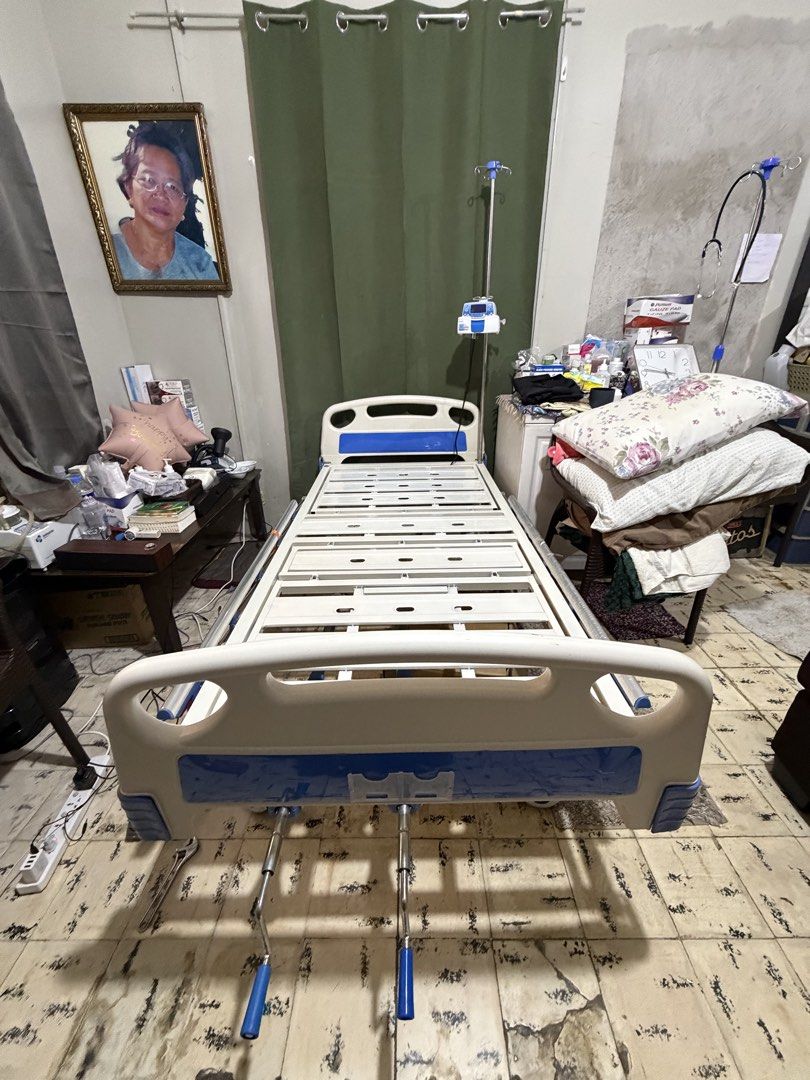 Adjustable Hospital Bed with IV line (Category: Bed Frames & Mattresses) located in Muntinlupa City. Submitted by mayuuunaise (Listing ID 1457724473, Image 2). Description: Adjustable Hospital Bed Frame with IV line for sale. No issues - good as new. Infusion pump seen in the photos are not included. Bed was only used for 1 month. No mattress included since we decided to keep it. Shipping will be shouldered by the buyer. Thank you!.