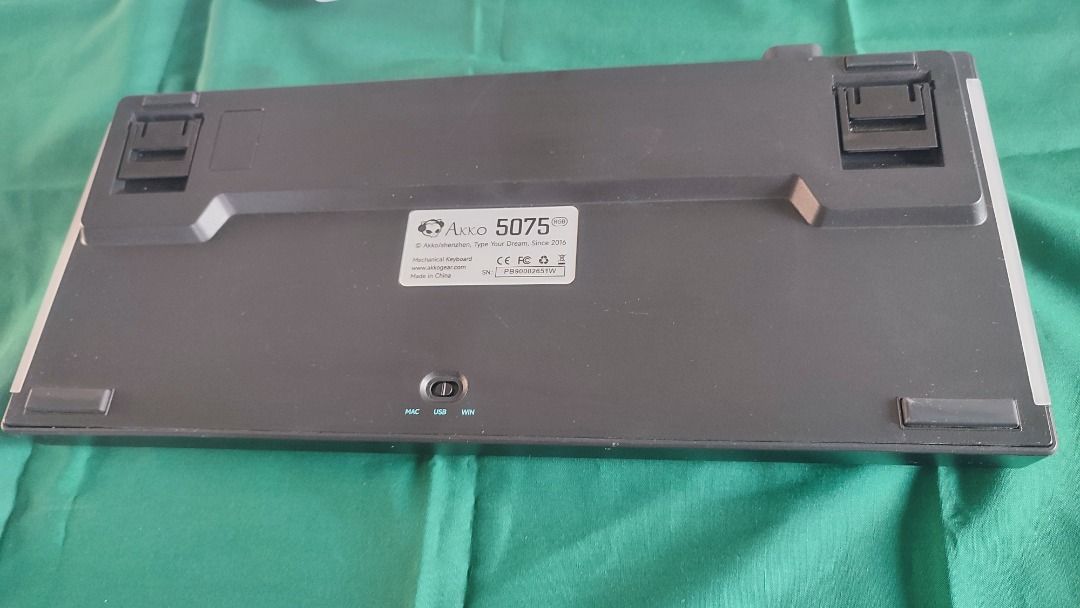 Akko 5075RGB with extra switches (Category: Computer Keyboard) located in Manila. Submitted by appcoycoy (Listing ID 1457842666, Image 3). Description: Akko 5075RGB V1 75% keyboard (slightly unresponsive) The back of the keyboard has a product sticker with the model number. It also has adjustable feet. Wired mode only. Customized assorted key switches. (Akko jelly black v1 and Akko wine red) Keyboard Switches 75 pieces assorted -Tecsee purple pan
