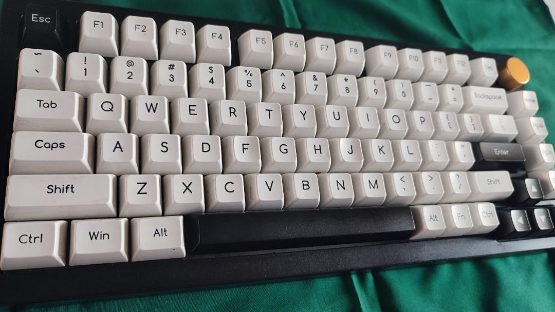 Akko 5075RGB with extra switches (Category: Computer Keyboard) located in Manila. Submitted by appcoycoy (Listing ID 1457842666, Image 2). Description: Akko 5075RGB V1 75% keyboard (slightly unresponsive) The back of the keyboard has a product sticker with the model number. It also has adjustable feet. Wired mode only. Customized assorted key switches. (Akko jelly black v1 and Akko wine red) Keyboard Switches 75 pieces assorted -Tecsee purple pan