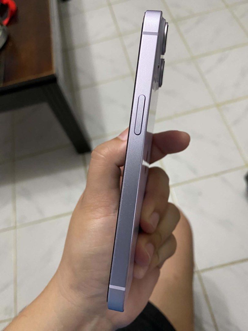 Apple iPhone 14 Purple (Category: iPhone 14 Series) located in Calamba. Submitted by janeecaraan (Listing ID 1457824168, Image 3). Description: - Apple iPhone 14 - Stunning Purple color - Dual rear camera system - Sleek design with side buttons - Ready for its new owner!.