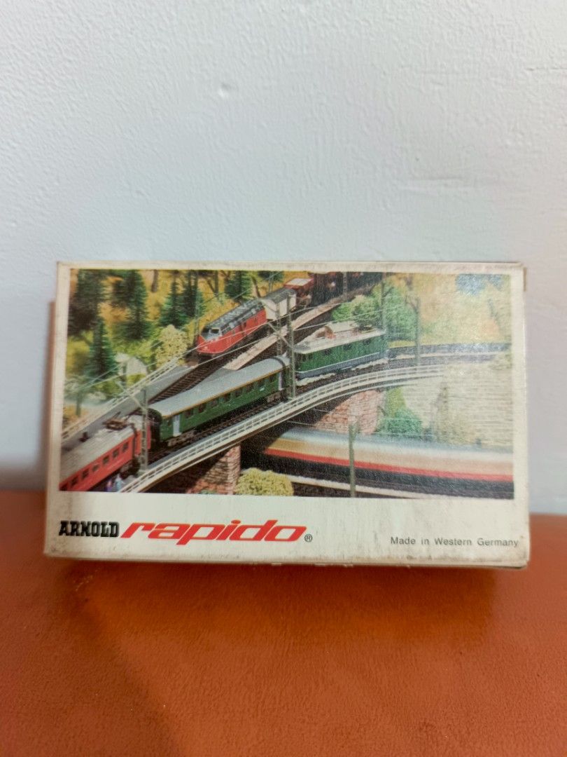 Arnold Rapido N Scale Model Train Kit Made in Western Germany (Category: Gundam & Model Kits) located in Muntinlupa City. Submitted by kencasia (Listing ID 1457772709, Image 1). Description: - Arnold Rapido N scale model train kit - Made in Western Germany - Construction kit for model train enthusiasts - Perfect for building your own railway layout - Highly collectible item for train lovers.