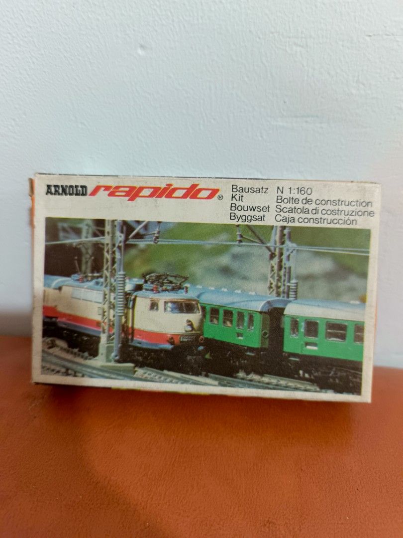Arnold Rapido N Scale Model Train Kit Made in Western Germany (Category: Gundam & Model Kits) located in Muntinlupa City. Submitted by kencasia (Listing ID 1457772709, Image 2). Description: - Arnold Rapido N scale model train kit - Made in Western Germany - Construction kit for model train enthusiasts - Perfect for building your own railway layout - Highly collectible item for train lovers.