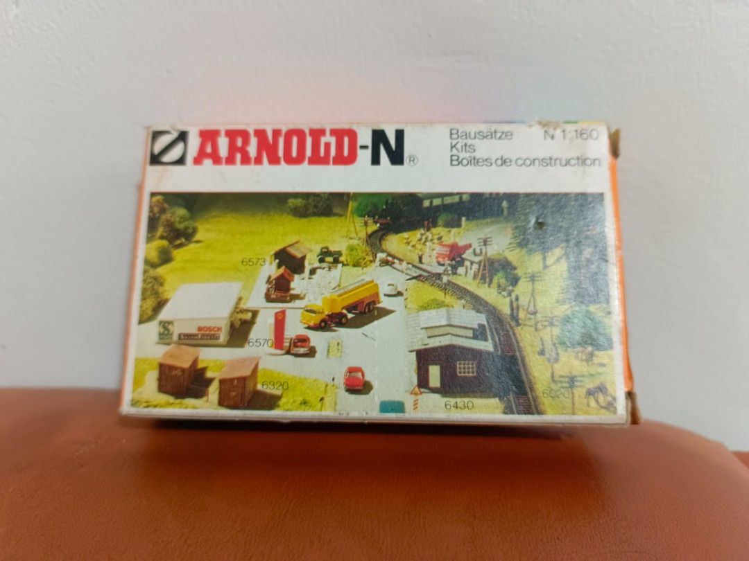 Arnold-N N 1:160 Scale Model Train Building Kits (Category: Gundam & Model Kits) located in Muntinlupa City. Submitted by kencasia (Listing ID 1457772396, Image 1). Description: - Arnold-N N scale model building kits - Perfect for N 1:160 scale model railway layouts - Includes various building kits for your village and railway scenes - Ideal for hobbyists and model train enthusiasts - Box shows wear, but contents appear to be sealed.