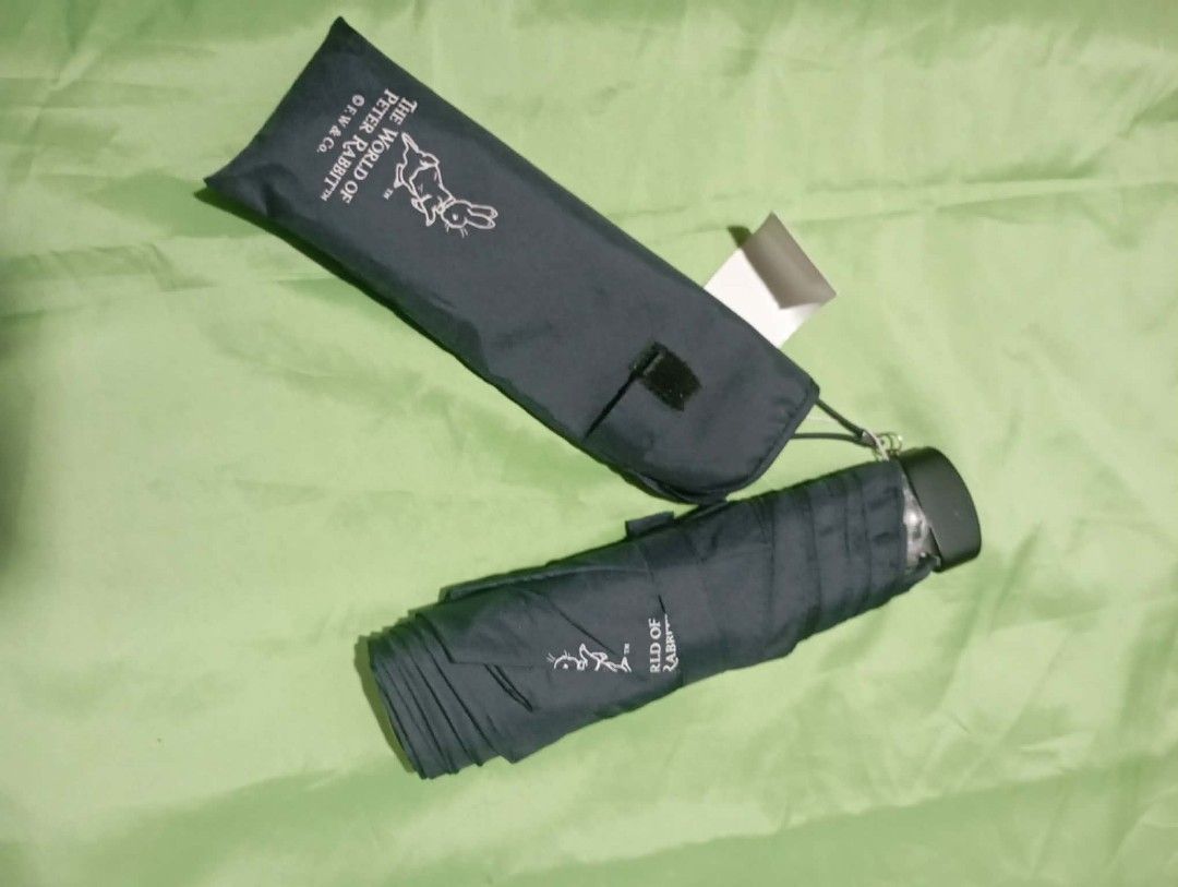 Assorted Umbrellas: Peter Rabbit, Pierre Cardin, and more (Category: Umbrellas) located in Manila. Submitted by scherielar31543 (Listing ID 1457761708, Image 3). Description: - foldable umbrellas fr Japan - Includes: Peter Rabbit themed, Pierre Cardin floral print, plain green, and dark grey with wooden handle - All umbrellas are foldable - Each umbrella comes with its own sleeve - Ideal for staying dry on rainy days .