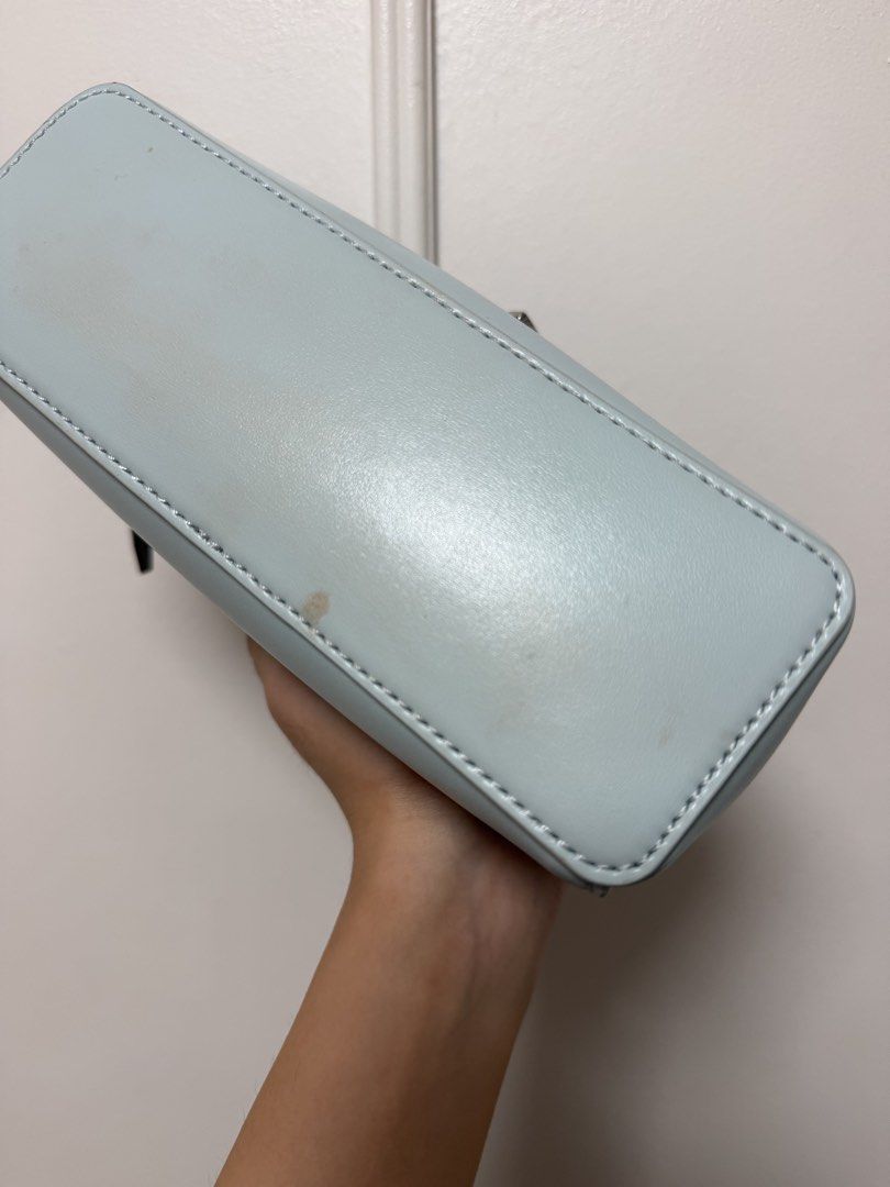 Authentic Charles & Keith Light Blue Vanity Case Bag (Category: Luxury Bags & Wallets) located in Davao. Submitted by embellished.ph (Listing ID 1457816800, Image 3). Description: ✨Light blue Charles & Keith vanity case bag ✨ Comes with a detachable strap ✨ There are minor marks and few stains on the bottom and a few small specks on the corner Feel free to message for more inquiries 💗.