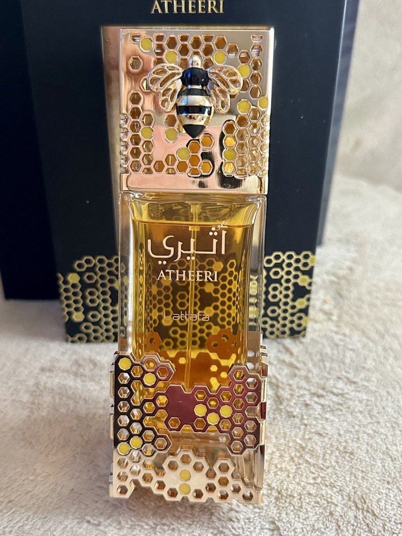 Authentic Lattafa Atheeri Perfume (Category: Fragrance & Deodorants) located in Manila. Submitted by aly_tan0903 (Listing ID 1457853776, Image 2). Description: - Lattafa Atheeri Eau de Parfum - Full bottle, never used - Fragrance Profile: Warm and sweet aroma - Exquisite bottle design: Features a bee motif with honeycomb accents - Ideal for gifting or personal indulgence - A unique and captivating scent.