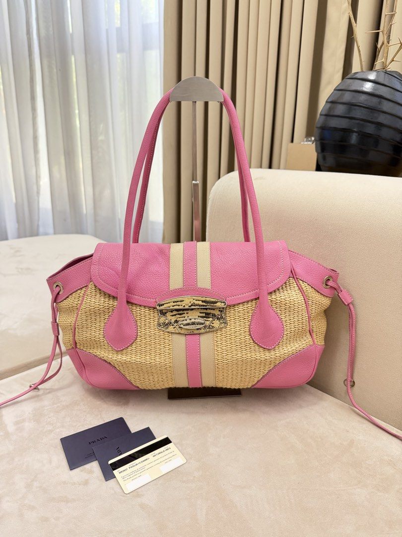 Authentic Prada Woven Raffia Shoulder Bag (Category: Luxury Bags & Wallets) located in Manila. Submitted by maria_2326 (Listing ID 1457758406, Image 1). Description: Prada Woven Raffia Shoulder Bag Beach Bag Guarantee Authentic Inclusions: Prada Authentication Card and booklet only No lowballing Location: Manila/QC.