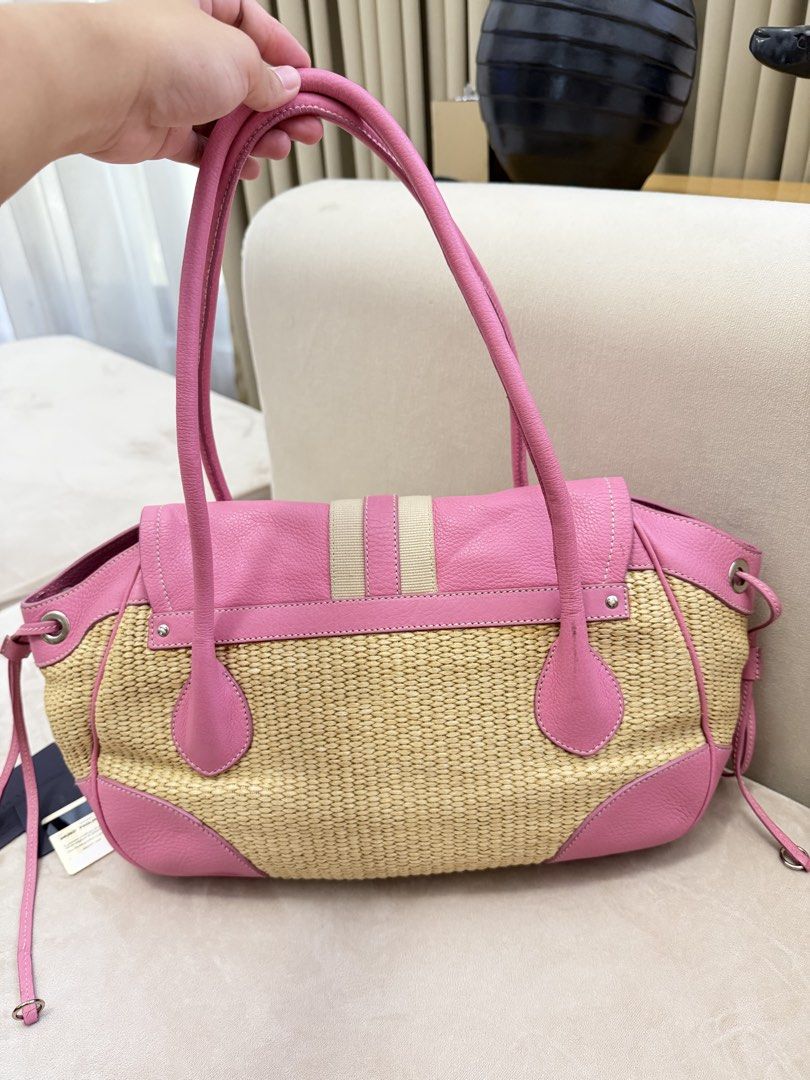 Authentic Prada Woven Raffia Shoulder Bag (Category: Luxury Bags & Wallets) located in Manila. Submitted by maria_2326 (Listing ID 1457758406, Image 2). Description: Prada Woven Raffia Shoulder Bag Beach Bag Guarantee Authentic Inclusions: Prada Authentication Card and booklet only No lowballing Location: Manila/QC.