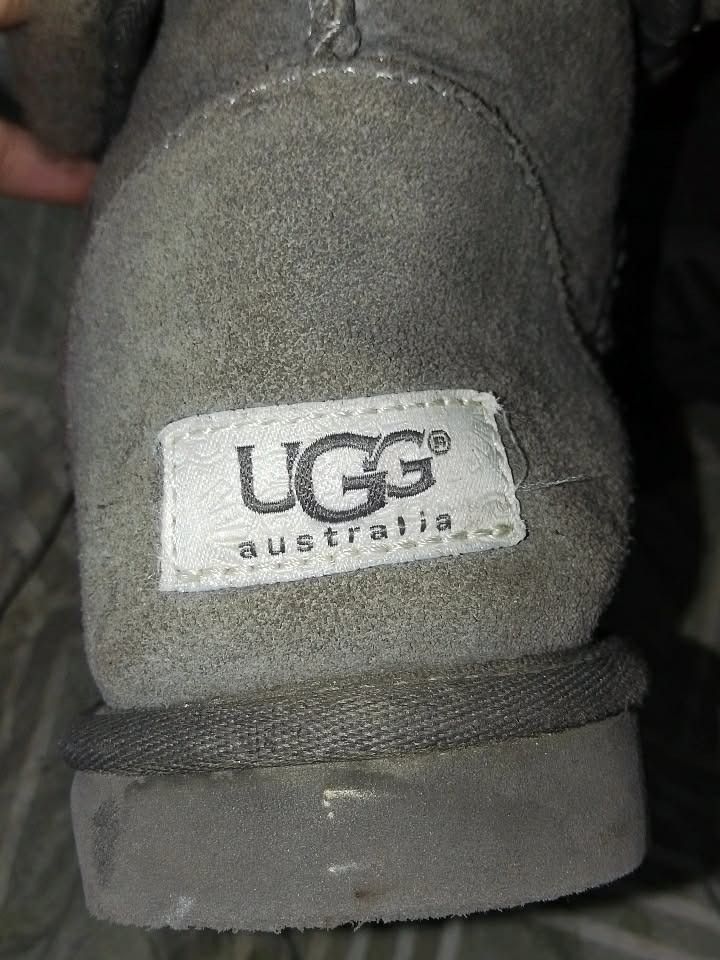 Authentic UGG Gray Shearling Boots (Size 7 US Women's) (Category: Boots) located in Caloocan City. Submitted by lirilarp (Listing ID 1457857021, Image 3). Description: (RUSH SALE NEED CASH) (price negotiable) Brand: UGG Australia Color: Gray Condition: Good secondhand condition. The inner shearling fur lining is clean and fluffy. Looks great when rolled down. Pls manage expectations: -Thrifted item -Has some light, typical color shading/faded wat