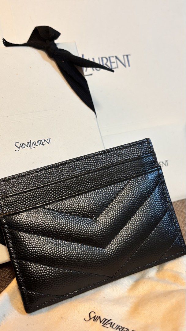 Authentic YSL card holder (Category: Luxury Bags & Wallets) located in Angeles City. Submitted by clearspaceco480 (Listing ID 1457902588, Image 3). Description: >Saint Laurent Cassandre Matelassé Card Case in Grain de Poudre Embossed Leather in Gold hard ware. >bought from miss charm (check her IG) >Well taken care of & barely used >ALL INCLUSION INCLUDED (paper bag, dust bag, box, and booklet) >GUARANTEED AUTHENTIC >Open for layaway for a month.