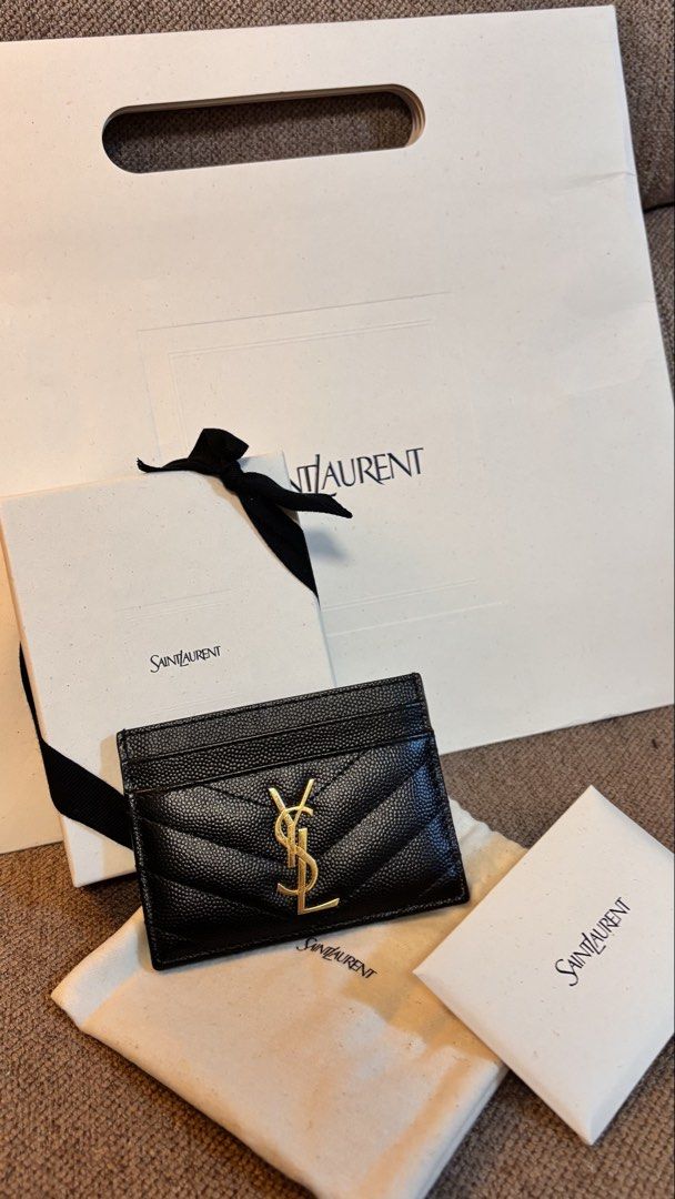 Authentic YSL card holder (Category: Luxury Bags & Wallets) located in Angeles City. Submitted by clearspaceco480 (Listing ID 1457902588, Image 1). Description: >Saint Laurent Cassandre Matelassé Card Case in Grain de Poudre Embossed Leather in Gold hard ware. >bought from miss charm (check her IG) >Well taken care of & barely used >ALL INCLUSION INCLUDED (paper bag, dust bag, box, and booklet) >GUARANTEED AUTHENTIC >Open for layaway for a month.