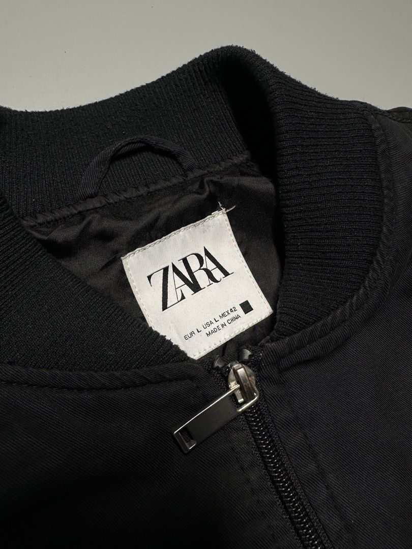 B1 J - 0007 ZARA Oversized Zip-Up Bomber Jacket (Category: Coats, Jackets and Outerwear) located in Bauang. Submitted by laceituplu (Listing ID 1457889145, Image 2). Description: black oversized zip-up bomber jacket from Zara, featuring a ribbed collar, full front zipper, and front welt pockets. MODE OF PAYMENT: Gcash/Maya /Maribank LOCATION: Bauang La Union.