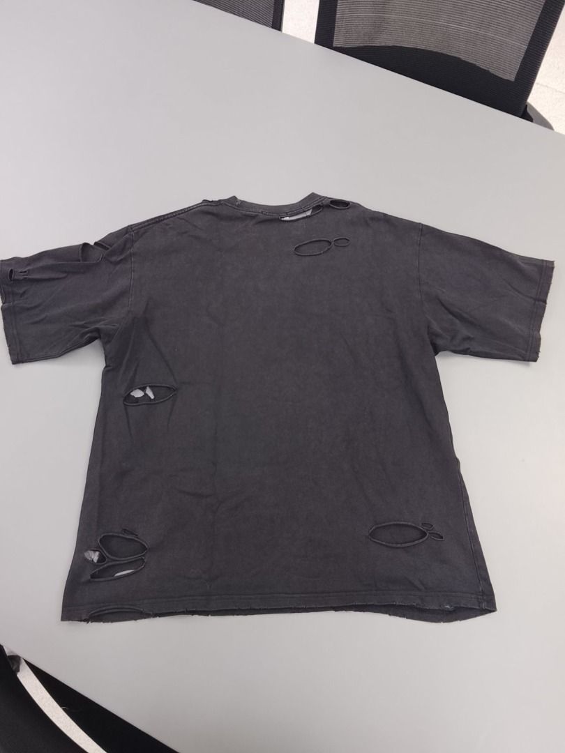 Balenciaga Distressed Logo Shirt (Category: Luxury Apparel) located in Pasig City. Submitted by thriftshop.pinas (Listing ID 1457799957, Image 3). Description: Balenciaga Distressed Logo Shirt -Size: Large on tag best fit to XL -Dimes: 24 x 30 -Condition: Good condition -Complete Tags -No issue at all.