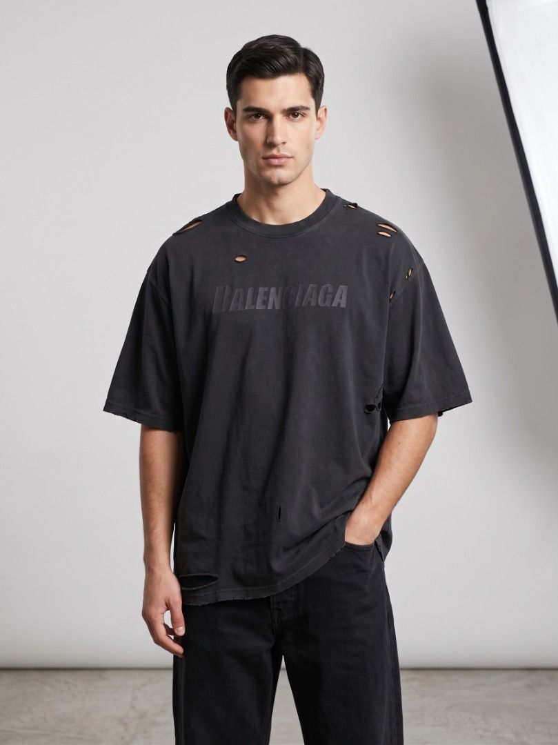 Balenciaga Distressed Logo Shirt (Category: Luxury Apparel) located in Pasig City. Submitted by thriftshop.pinas (Listing ID 1457799957, Image 1). Description: Balenciaga Distressed Logo Shirt -Size: Large on tag best fit to XL -Dimes: 24 x 30 -Condition: Good condition -Complete Tags -No issue at all.