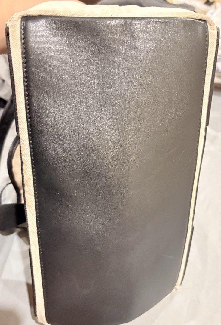 Balenciaga Paris Canvas Tote Bag (Category: Luxury Bags & Wallets) located in Caloocan City. Submitted by fierce_mica29 (Listing ID 1457715365, Image 3). Description: - Balenciaga Paris tote bag - Color: Cream canvas with black leather trim - Closure: Top zipper - Includes: Separate zippered pouch - Condition: Minor marks on canvas (especially pouch), zipper pull shows wear - Perfect for everyday use .