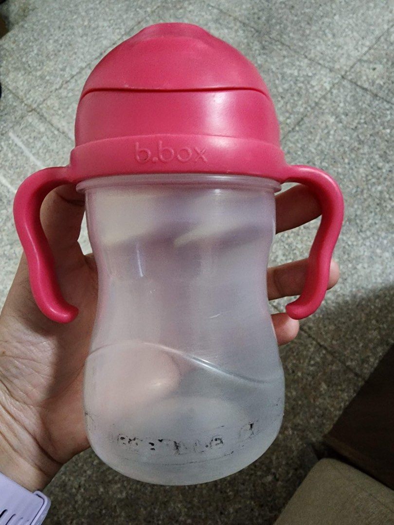 b.box Sippy Cup with Handles and Straw (Category: Weaning & Toddler Feeding) located in Manila. Submitted by kristielyntan (Listing ID 1457754903, Image 1). Description: - B.Box Sippy Cup - Features easy-grip handles - Includes an internal straw for drinking - Available colors: Pink and Peach - Ideal for toddlers developing independent drinking skills - Simple to clean and use.