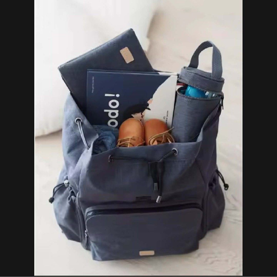 BEABA Diaper Bag Backpack Grey with Changing Mat & Bottle Holder (Category: Diaper Bags & Wetbags) located in Manila. Submitted by kristielyntan (Listing ID 1457725463, Image 2). Description: - BEABA Grey Diaper Bag Backpack - Multiple compartments for organization - Includes changing mat - Includes bottle holder - Durable material - Comfortable backpack straps for easy carrying.