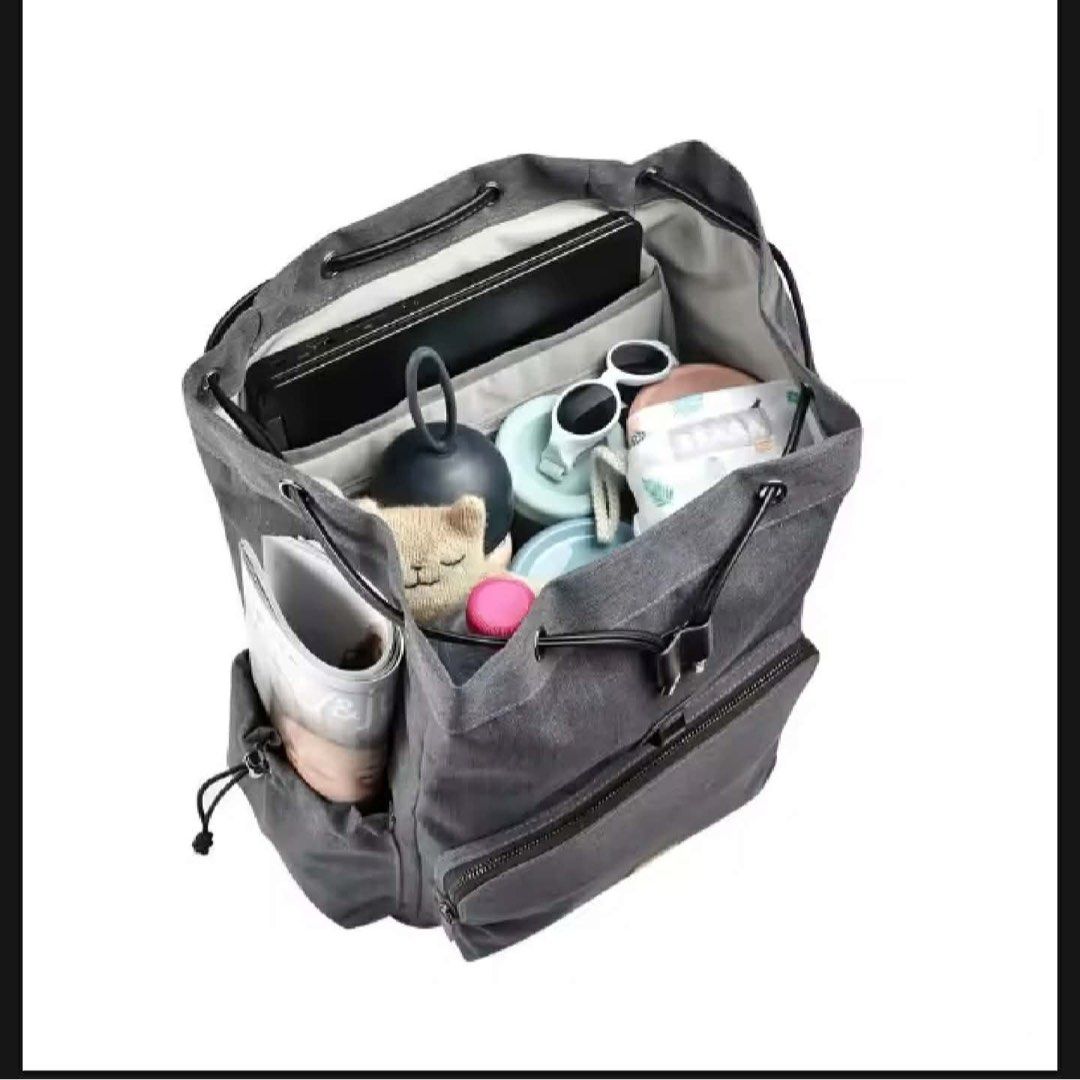 BEABA Diaper Bag Backpack Grey with Changing Mat & Bottle Holder (Category: Diaper Bags & Wetbags) located in Manila. Submitted by kristielyntan (Listing ID 1457725463, Image 3). Description: - BEABA Grey Diaper Bag Backpack - Multiple compartments for organization - Includes changing mat - Includes bottle holder - Durable material - Comfortable backpack straps for easy carrying.