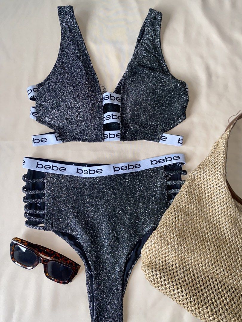 Bebe Sparkly Glitter Bikini Set (Category: Bikinis & Swimsuits) located in Tarlac. Submitted by rieselects (Listing ID 1456579708, Image 1). Description: - Sparkly Bebe glitter bikini set - Features iconic Bebe logo band on top and bottoms - High-waisted bottoms with trendy strappy sides - Deep V-neck top with stylish cutouts - Make a statement at the beach or pool!.