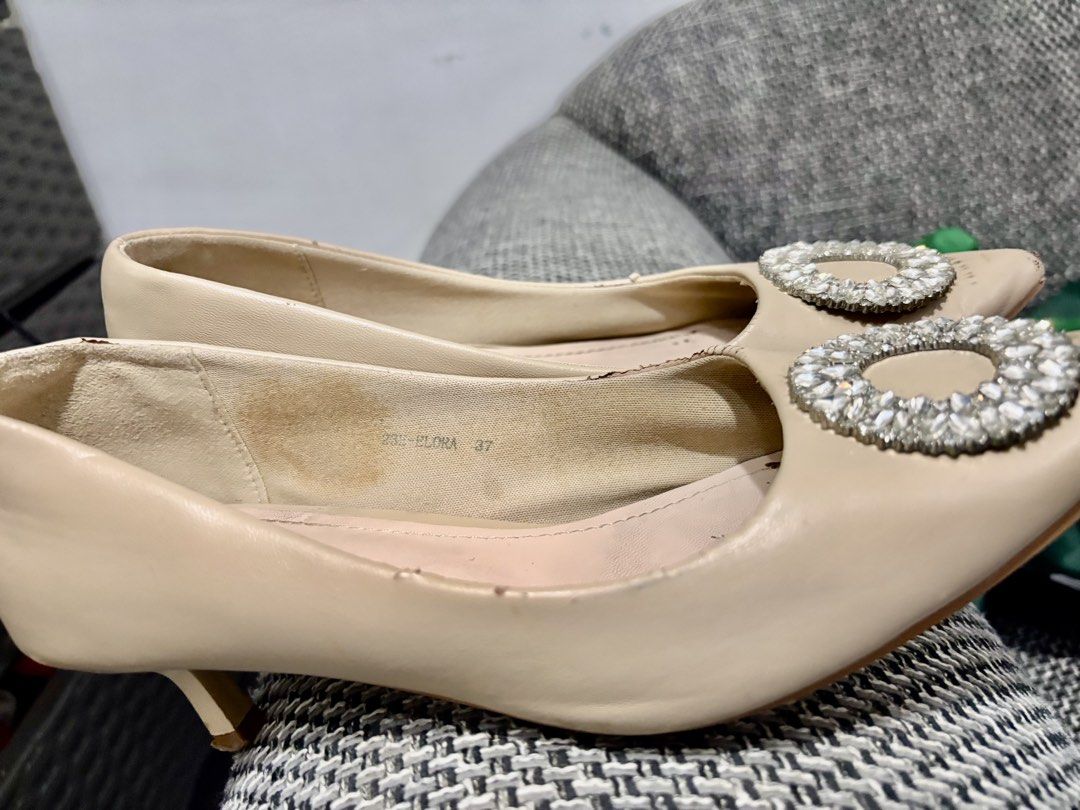 Beige Heels with Rhinestone Buckle Size 37 (Category: Heels) located in Manila. Submitted by bright_lamb (Listing ID 1457811302, Image 1). Description: - Beige kitten heel shoes - Size 37 - Features a pretty rhinestone buckle - Some marks inside from wear - Low heel height, comfortable for all-day wear - Ideal for dressing up casual or formal outfits.