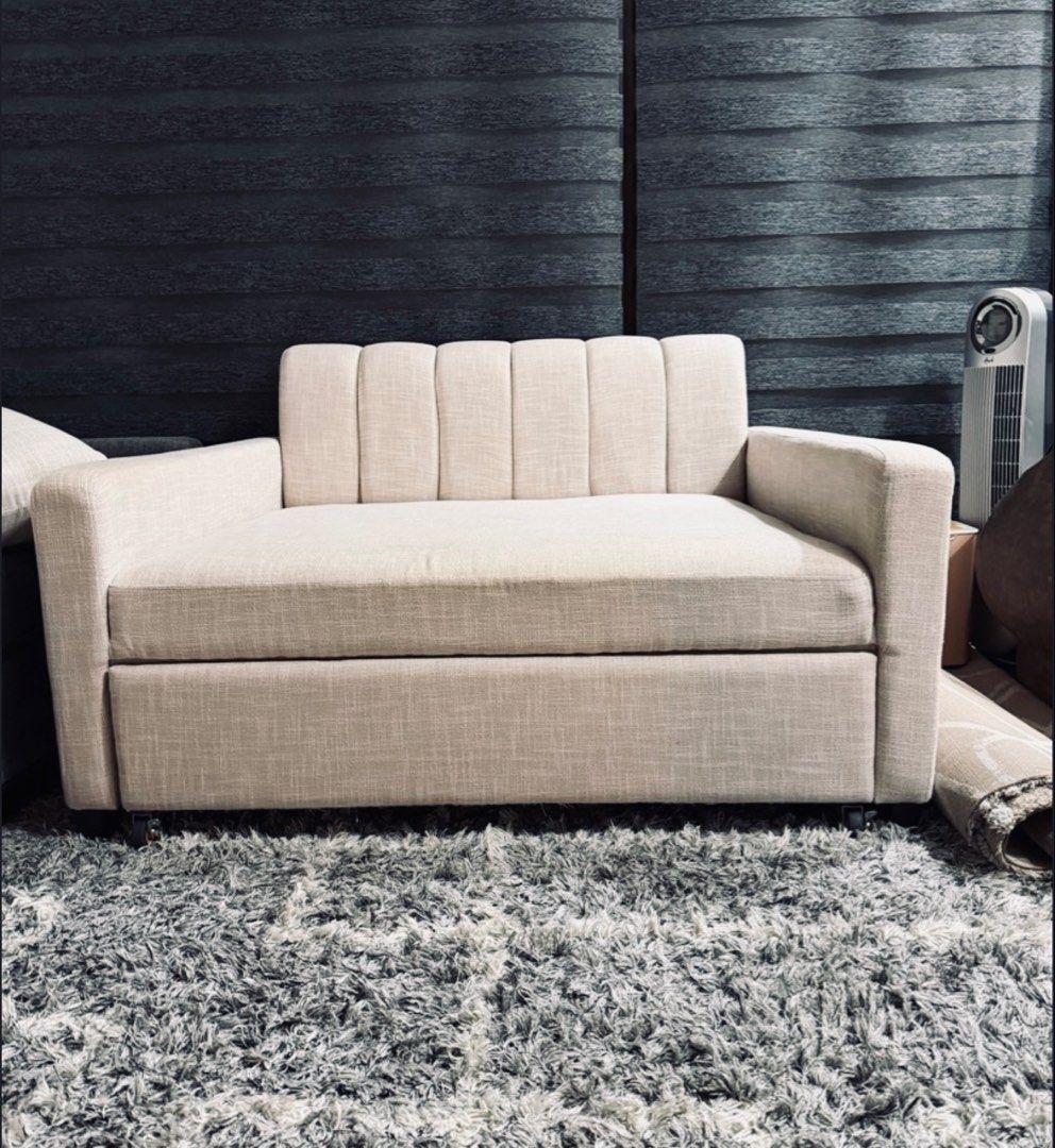 Beige Sofa Bed with Pillows (Category: Sofas) located in Guiguinto. Submitted by ebh19 (Listing ID 1427214002, Image 3). Description: Good for small rooms, condo units. Customized sofa bed Size: 130 cm arms to arms by 108 cm sofa mode Bed - 184 cm With pillows • good lumber • marine plywood • Uratex foam Purchased from MRA Furniture Rfs: no longer used.