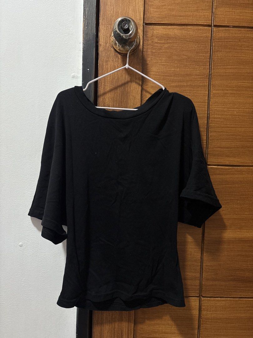 Black cinched waist shirt (Category: Blouses) located in Tuguegarao City. Submitted by shopaholiccccs (Listing ID 1457804680, Image 2). Description: small- medium stretchable cinched waist flare sleeves - Basic black t-shirt - Relaxed fit - Short sleeves - Ideal for everyday wear - Versatile and easy to style.