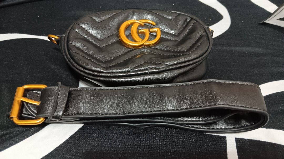 Gucci Belt Bag (Category: Luxury Bags & Wallets) located in Cavite. Submitted by saycolonia29. (Listing ID 1457726816, Image 1). Description: May flaws na po sa Gucci logo sa front, nabura na din ang Gucci Made in Italy at may sira sa belt see on pictures. Pero super ganda pa ng loob at leather sa labas. No inclusions na po, bag lang talaga pero from Dubai yan - Black quilted belt bag - Iconic gold GG logo hardware - Cute heart detail on the back