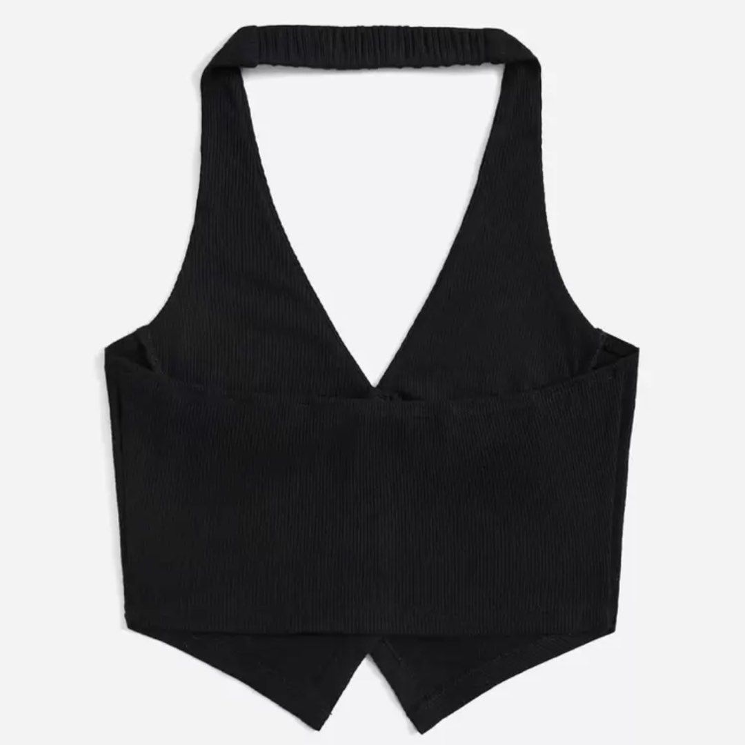 Black Ribbed Halter Cropped Top Vest (Category: Sleeveless) located in Manila. Submitted by itsandreaco (Listing ID 1457773084, Image 2). Description: - Body Measurements: Bust 33-35 inches / Waist 27-29 inches - Black ribbed halter neck cropped top - Button front detail, vest-like style - Stretchy material.