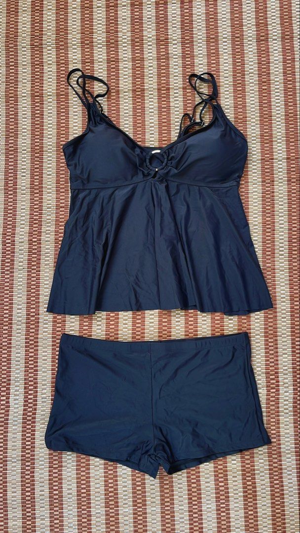 Black Tankini Swimsuit with Shorts (Category: Bikinis & Swimsuits) located in Davao. Submitted by chachaaarm (Listing ID 1457802671, Image 1). Description: Shein Black Tankini Swimsuit with Shorts. Size XXL. Adjustable straps, ring detail. Includes boy shorts. Comfortable and stylish..