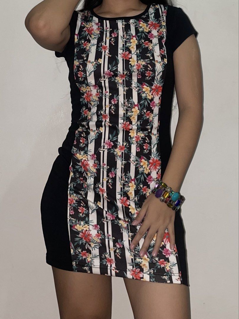 Bodycon Mini Dress w/ Back Cut-Out (Category: Dresses) located in Manila. Submitted by declutteredbyalex (Listing ID 1457840438, Image 1). Description: Brand: Cache Cache Size: Tagged 165/88A (Fits Small to Medium) - bodycon mini dress with striped floral front, solid black sides, and back cutout - stretchy, comfy fabric that hugs your curves nicely - in good condition, used twice only for event RFS: Decluttering.