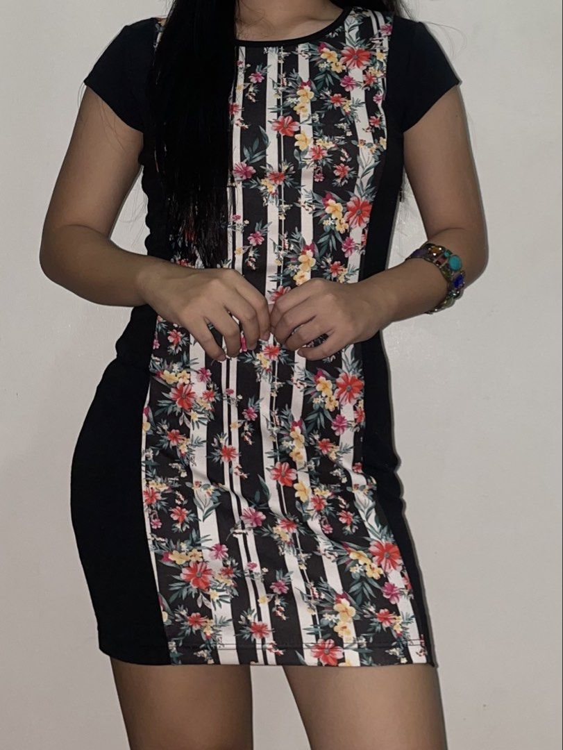 Bodycon Mini Dress w/ Back Cut-Out (Category: Dresses) located in Manila. Submitted by declutteredbyalex (Listing ID 1457840438, Image 2). Description: Brand: Cache Cache Size: Tagged 165/88A (Fits Small to Medium) - bodycon mini dress with striped floral front, solid black sides, and back cutout - stretchy, comfy fabric that hugs your curves nicely - in good condition, used twice only for event RFS: Decluttering.