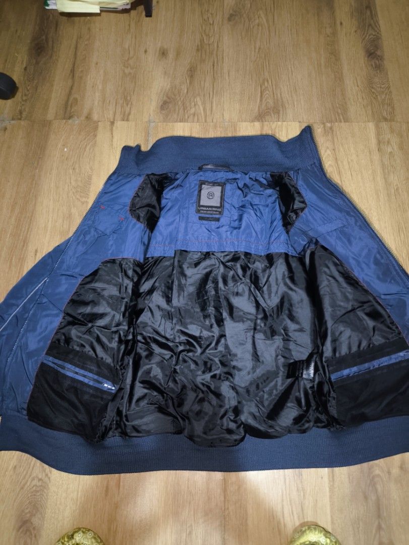 Bomber jacket (Category: Coats, Jackets and Outerwear) located in Manila. Submitted by sargmaverick (Listing ID 1457887870, Image 3). Description: - Navy blue bomber jacket by Urban Ring (Italian luxury brand) - Zip-up front closure - Two zippered front pockets - Black satin lining - Ribbed cuffs and hem - Size: X-Large - Ideal for casual wear width 21 length 26.