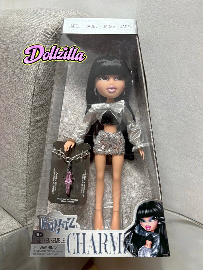 Bratz Charmz Jade Doll (Category: Kids Toys) located in Quezon City. Submitted by dollzilla (Listing ID 1457825027, Image 2). Description: Bratz Charmz Jade doll with black hair and silver outfit. Includes chain and collectible charm. 2 pcs Available on hand! 💅.