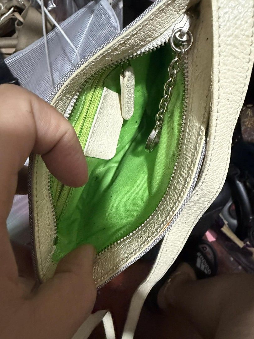 Bvlgari Monogram Canvas Pouch (Category: Luxury Bags & Wallets) located in Manila. Submitted by cruznarlyn63507 (Listing ID 1457846254, Image 3). Description: - Authentic Bvlgari pouch - All-over BVLGARI logo pattern - Color: Light blue canvas with cream trim - Closure: Zipper - Interior: Bright green fabric lining - Features: Small chain attached to zipper pull - Ideal for organizing small essentials.
