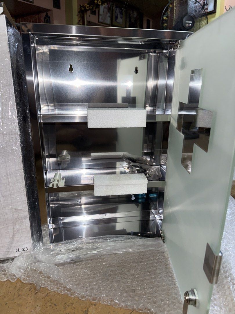 Cascade Rectangular Stainless Steel First Aid Cabinet (Category: Shelves, Cabinets & Racks) located in Manila. Submitted by terefficstuffs (Listing ID 1457772951, Image 3). Description: - Brand new Cascade First Aid Cabinet - Durable stainless steel construction - Elegant frosted glass door with a prominent cross design - Two internal shelves for organized storage - Secure lock with included key - Ideal for both home and office environments - Kee