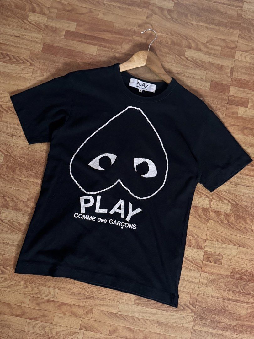 CDG PLAY (Category: Tshirts & Polo Shirts ) located in Mabalacat. Submitted by thunder.dz18 (Listing ID 1457890547, Image 1). Description: CDG Play “Big Logo Print” - Size: S (20x26) - Issue: hairlines - Condition: 9/10 - Color may vary due to lighting.