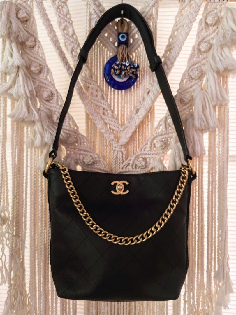 Chanel Black Quilted Leather Chain Shoulder Bag (Category: Luxury Bags & Wallets) located in Davao. Submitted by gelleevanelli (Listing ID 1457758218, Image 2). Description: *Vintage Chanel Soft Quilted Hobo Bag / Bucket Bag with Chain* ### *Bag Details from photos:* *Model*: Chanel "Soft Quilted" Hobo/Bucket Bag - early 2000s era - *Color*: Black lambskin leather with antique gold hardware - *Material*: Soft diamond-quilted leather. The leather 