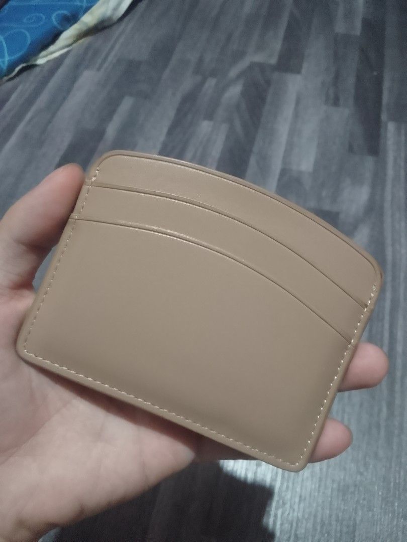 Christy Ng Yuki Card Holder - Beige (Category: Wallets & Card holders) located in Manila. Submitted by justffur (Listing ID 1457814101, Image 2). Description: FOR SALE CHRISTY NG CARD HOLDER details: -Latte Color -4 Card slots & 1 Central Slot -Vegan Leather Selling for 600 Malibay Pasay Location Lalamove G, yours fee.