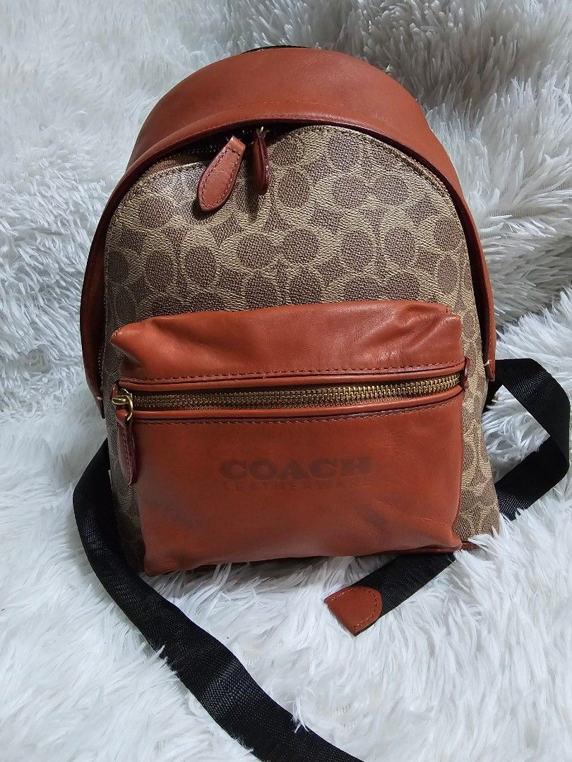 Backpack Coach (Category: Luxury Bags & Wallets) located in Cavite. Submitted by liveriver_514fd1 (Listing ID 1457746000, Image 1). Description: - Authentic Coach Backpack bag - Signature canvas with brown leather trim - Convenient front zip pocket - Adjustable strap for a custom fit - Breathable padded mesh back panel - Ideal for everyday carry.